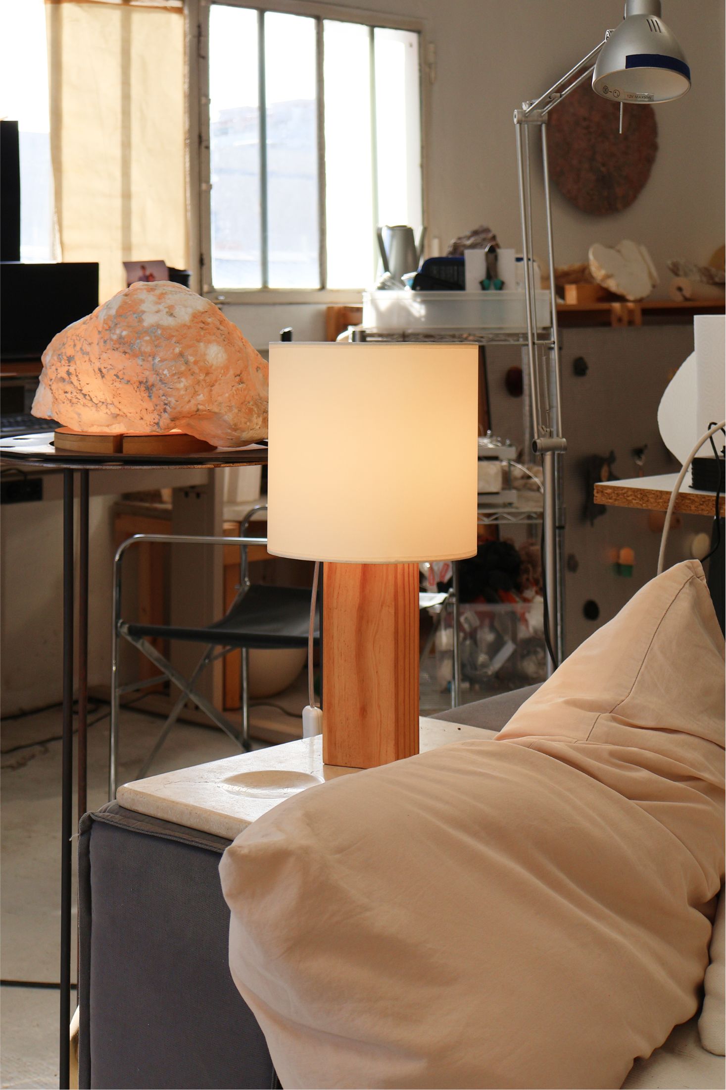 Lamp beside the sofa in the workshop
