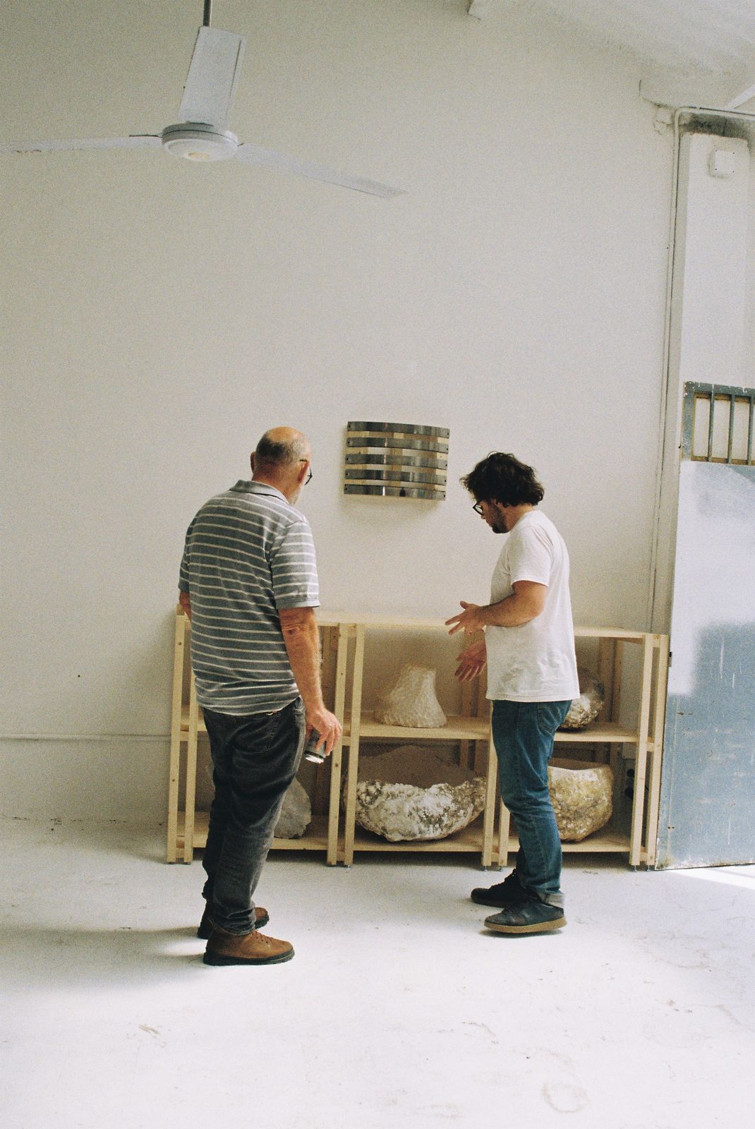 VORA HOUSE artisans discussing materials in the workshop