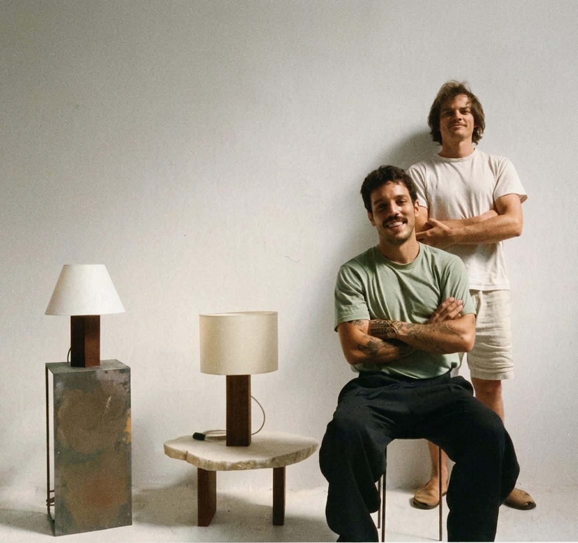 The two VORA HOUSE founders with their lamps